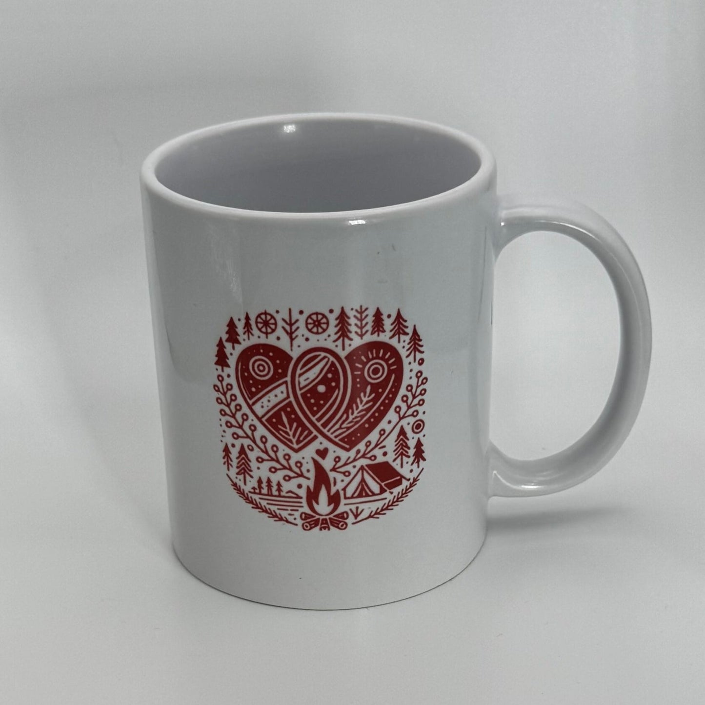 White mug with red design on a white background
