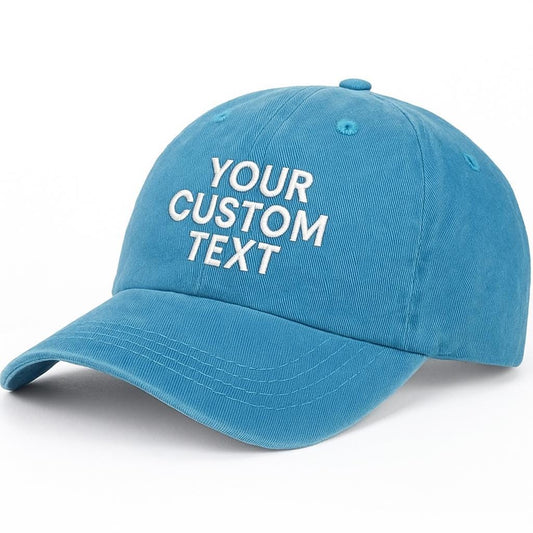 Blue cap with 'YOUR CUSTOM TEXT' printed on it against a white background