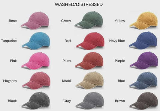 Collection of washed/distressed baseball caps in various colors on a white background.