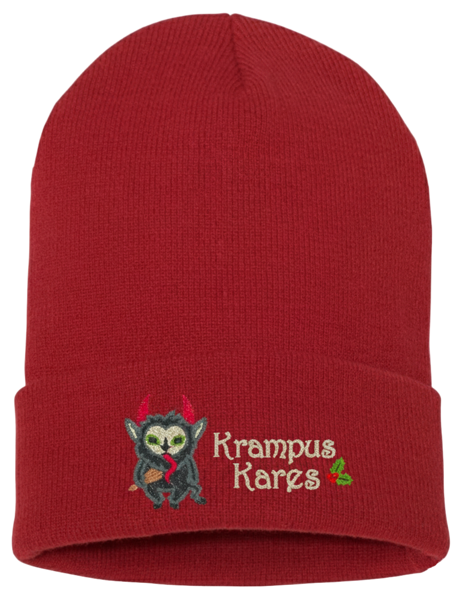Red beanie with Krampus Kares embroidery on a white background